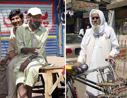 Pakistanis wearing the traditional salwar kameez at a market in Karachi