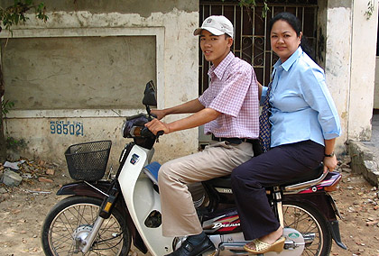 Nina riding at the backseat of a motorcycle, Da Nang