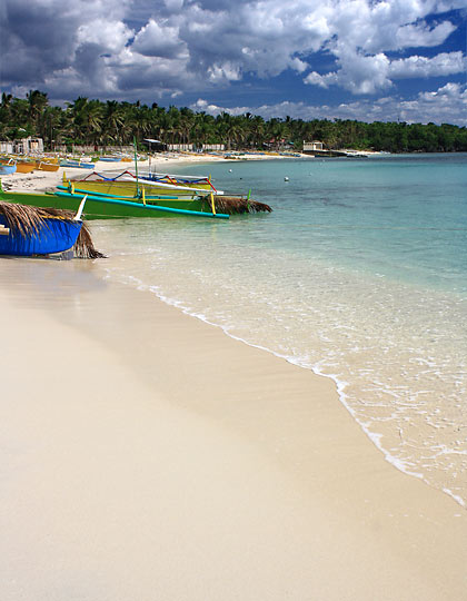 waves and fine sand at Tambobong Beach, Dasol, Pangasinan