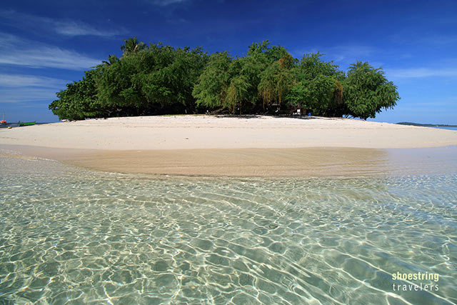 Potipot Island’s crystal-clear waters and creamy white sand beach
